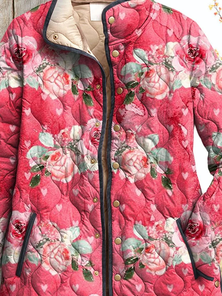 Charmant roze gewatteerd damesjack met bloemenprint