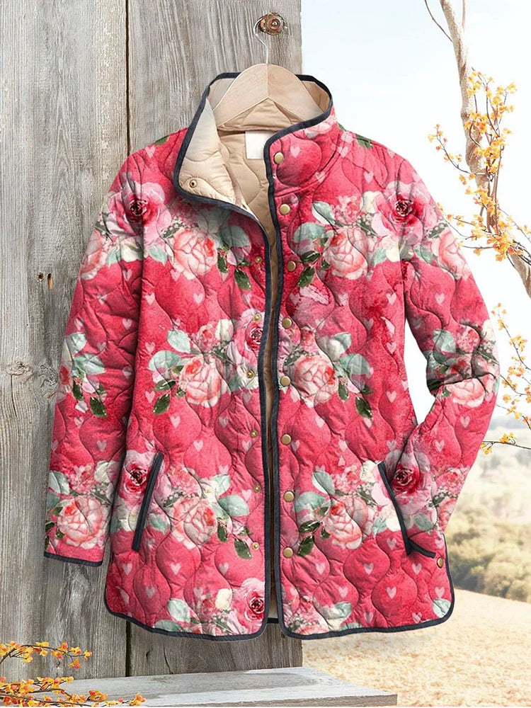 Charmant roze gewatteerd damesjack met bloemenprint